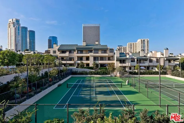 a view of a building with a yard