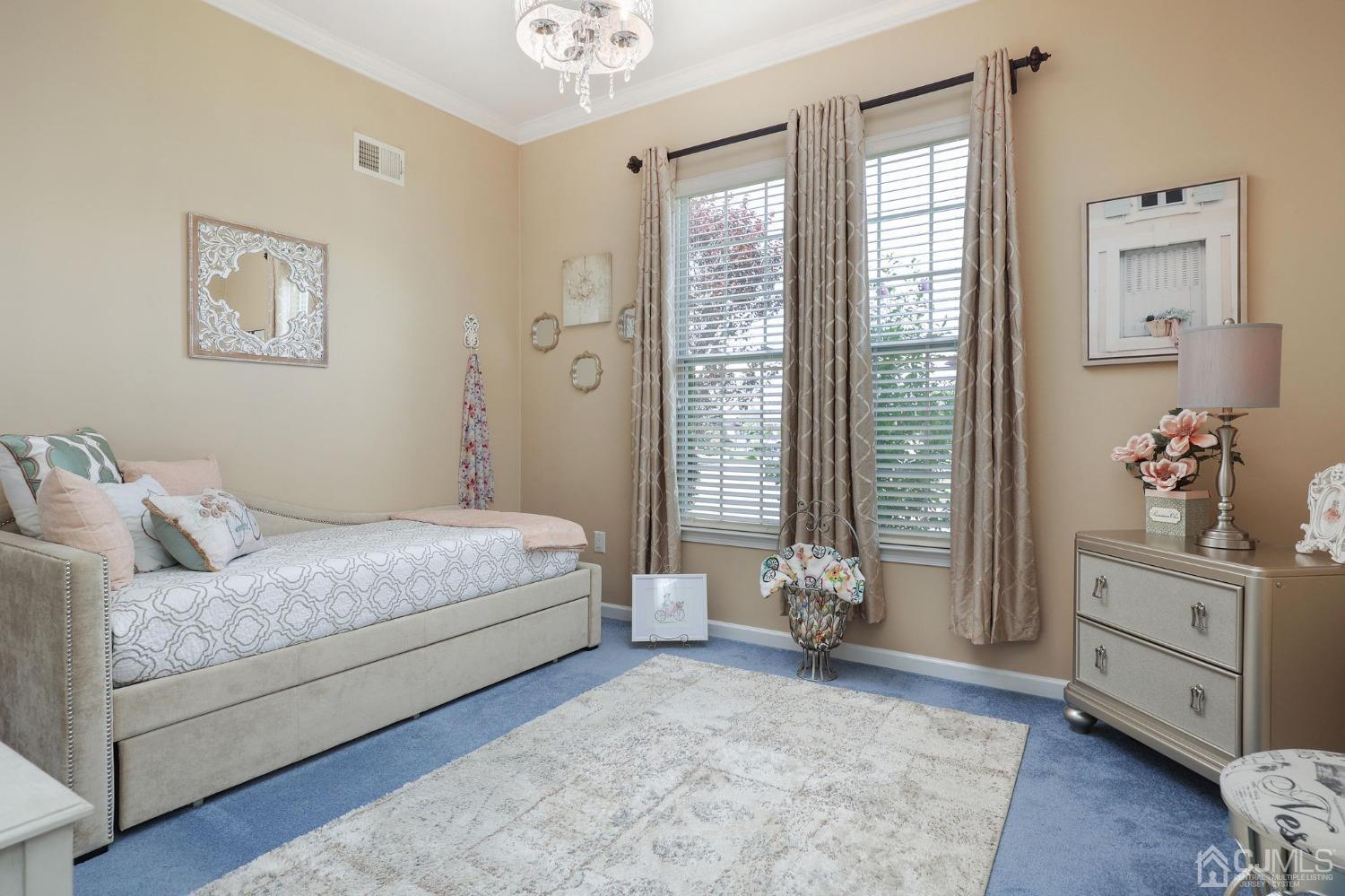 170 Tournament Drive Monroe Township, NJ 08831 - Photo 15 of 36 a bedroom with a balcony a bed and a window