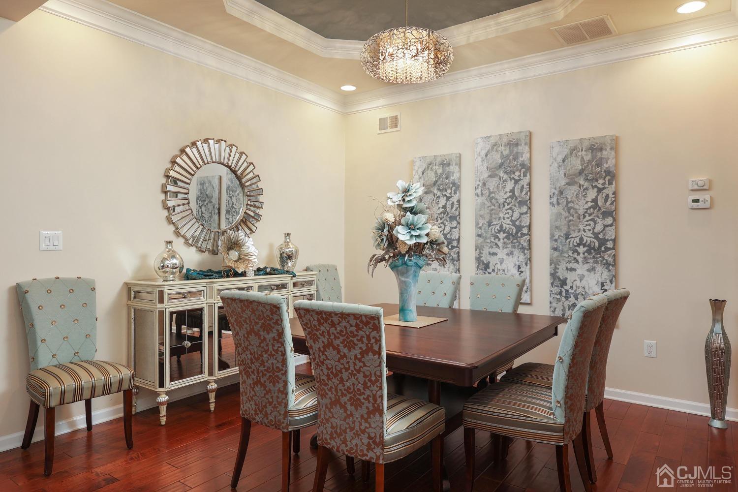 170 Tournament Drive Monroe Township, NJ 08831 - Photo 18 of 36 a view of a dining room with furniture window and wooden floor