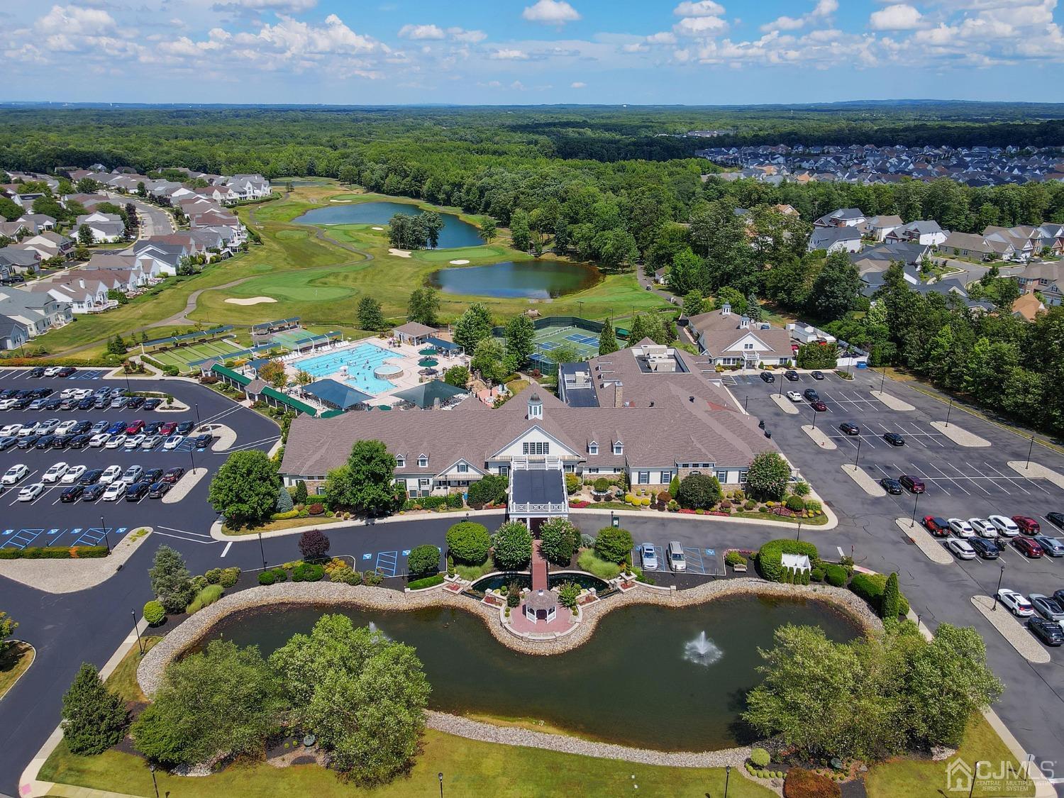 170 Tournament Drive Monroe Township, NJ 08831 - Photo 33 of 36 an aerial view of house swimming pool and lake view