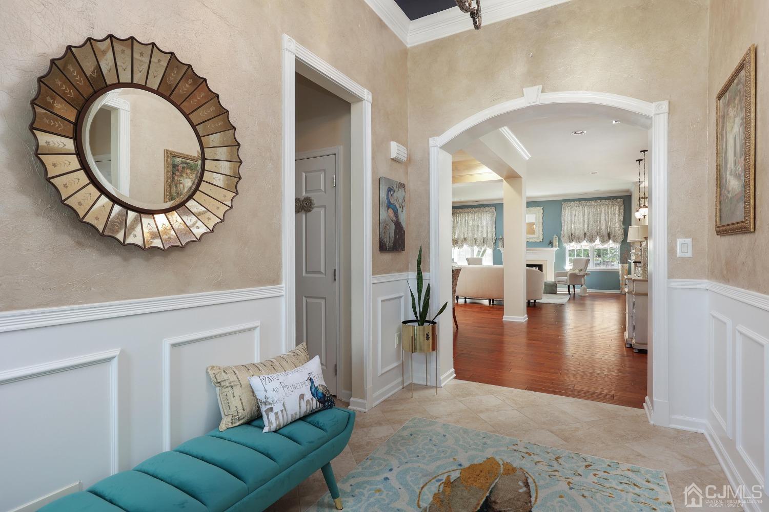 170 Tournament Drive Monroe Township, NJ 08831 - Photo 10 of 36 a living room with furniture and a mirror