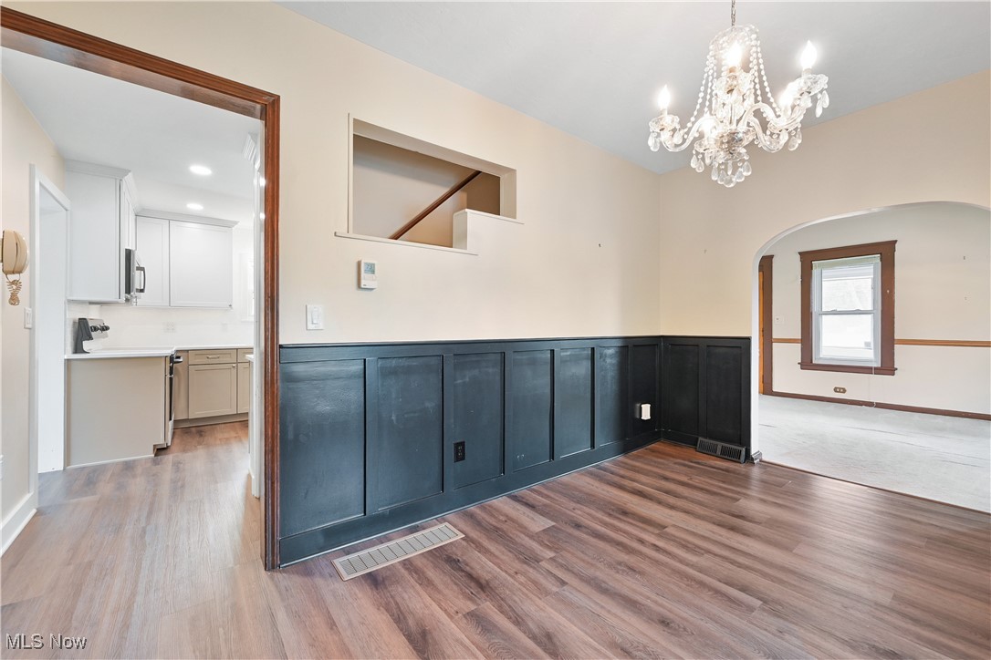 6379 Avon Belden Road North Ridgeville, OH 44039 - Photo 6 of 26 The perfect angel looking from the dining room to the living room and the kitchen