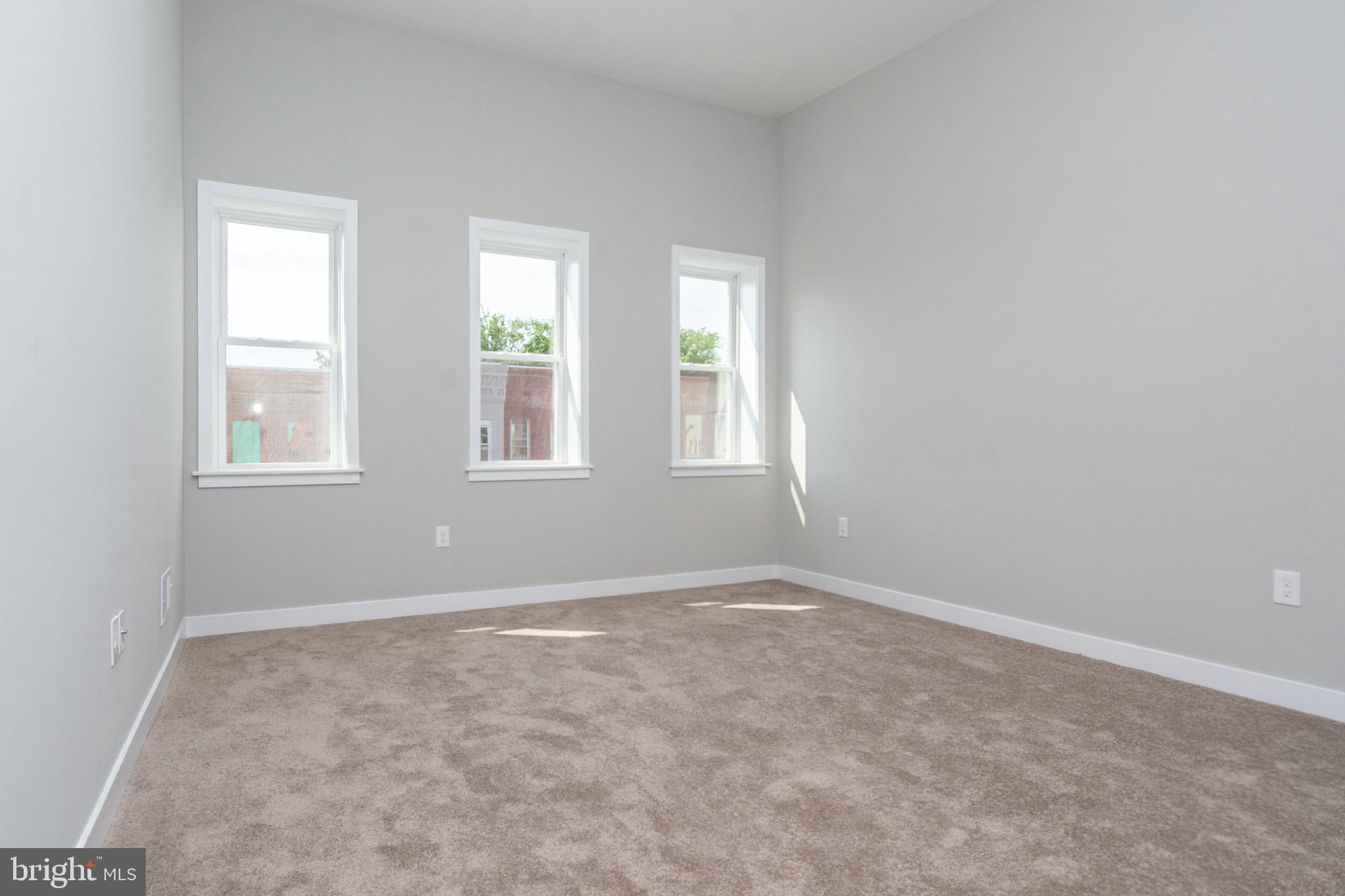 846 Edmondson Avenue Baltimore, MD 21201 - Photo 27 of 43 an empty room with windows