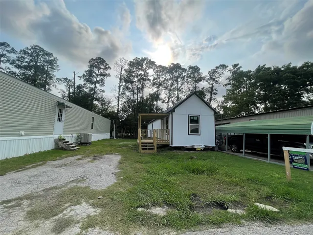 a house view with a garden space