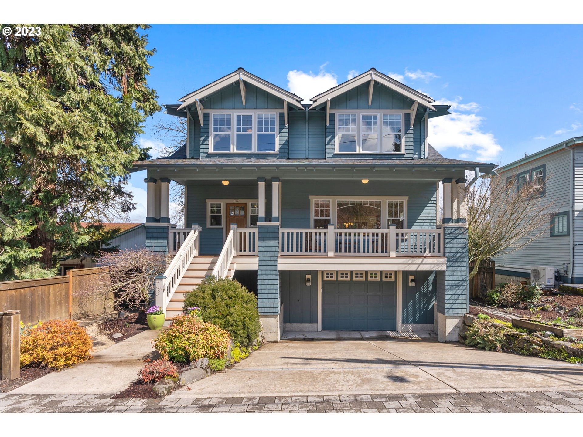 2126 Northwest 32nd Avenue Portland, OR 97210 - Photo 1 of 48 a front view of a house with a yard
