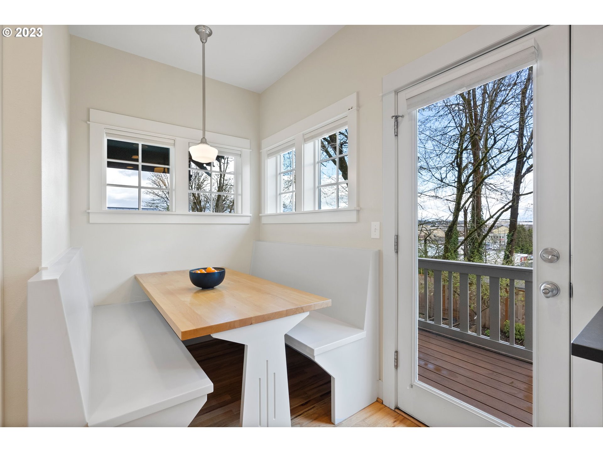 2126 Northwest 32nd Avenue Portland, OR 97210 - Photo 15 of 48 a view of a dining room with a table and chairs