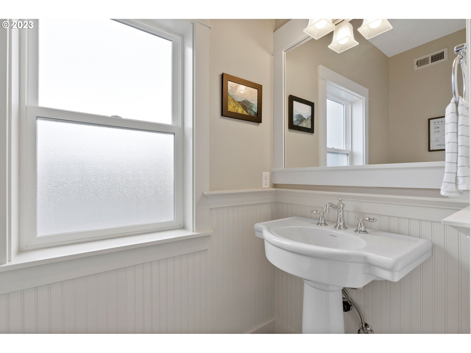 2126 Northwest 32nd Avenue Portland, OR 97210 - Photo 16 of 48 a bathroom with a sink and a mirror