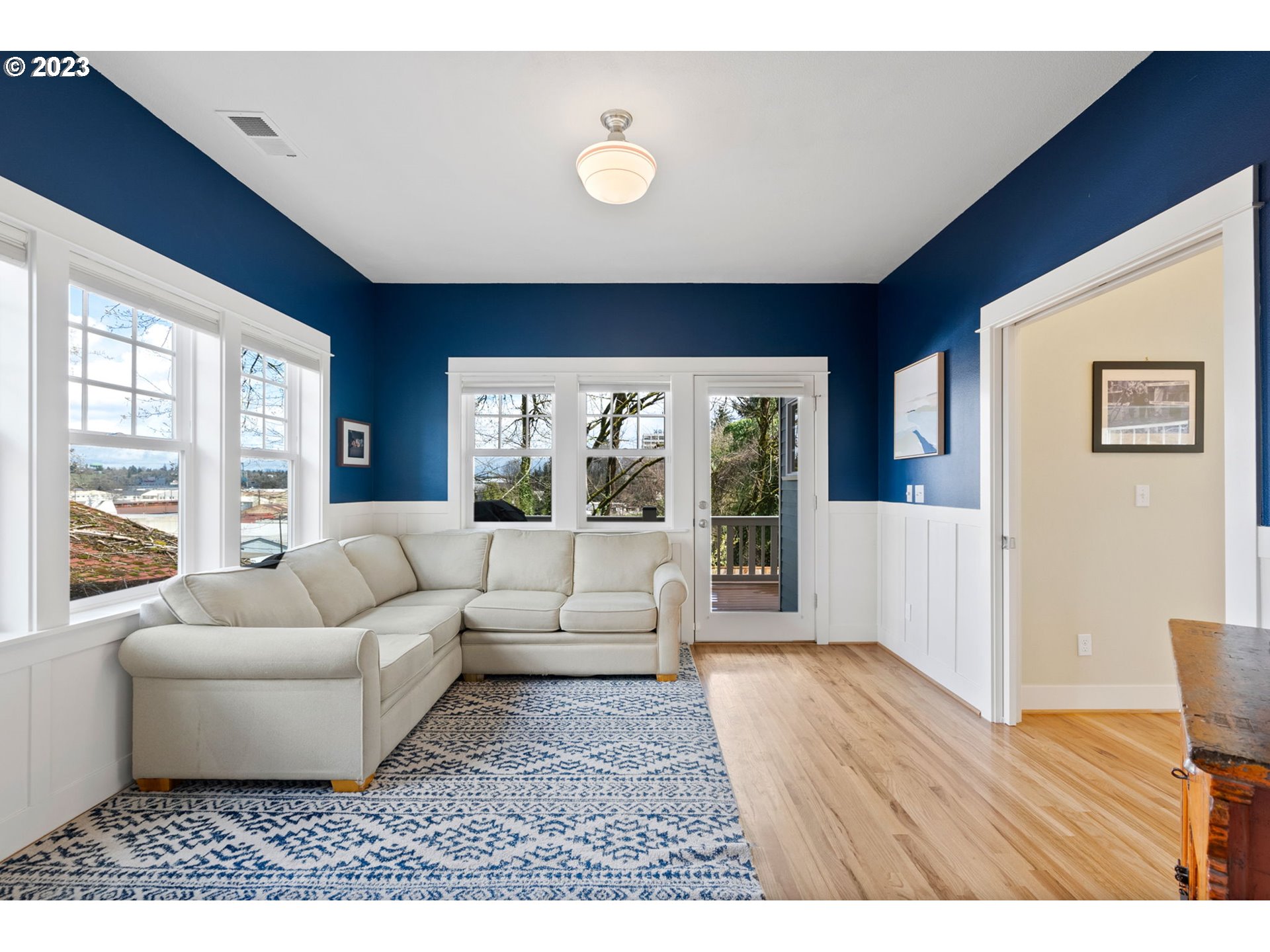 2126 Northwest 32nd Avenue Portland, OR 97210 - Photo 17 of 48 a living room with furniture and a large window