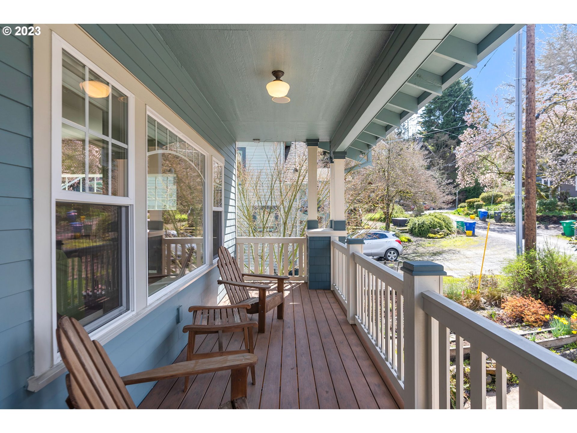2126 Northwest 32nd Avenue Portland, OR 97210 - Photo 2 of 48 a balcony view with a large window and wooden floor
