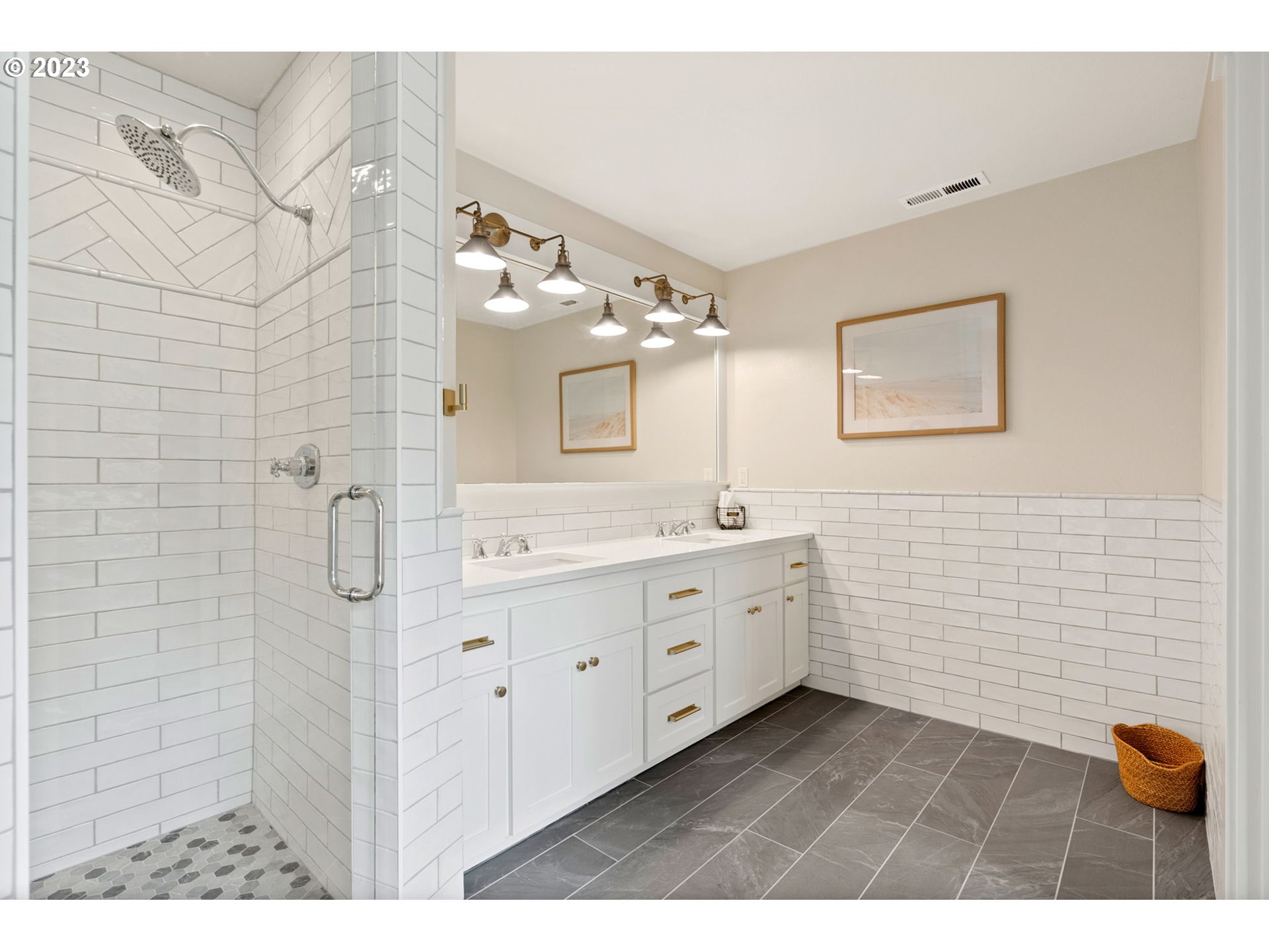 2126 Northwest 32nd Avenue Portland, OR 97210 - Photo 24 of 48 a bathroom with a double vanity sink toilet and shower