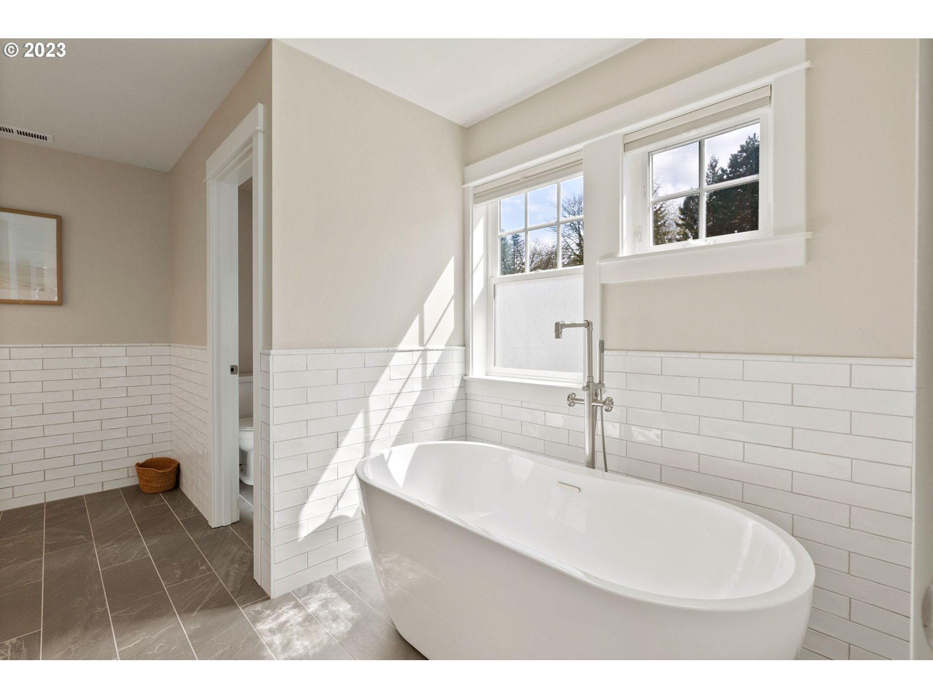 2126 Northwest 32nd Avenue Portland, OR 97210 - Photo 25 of 48 a bathroom with a sink and a bathtub