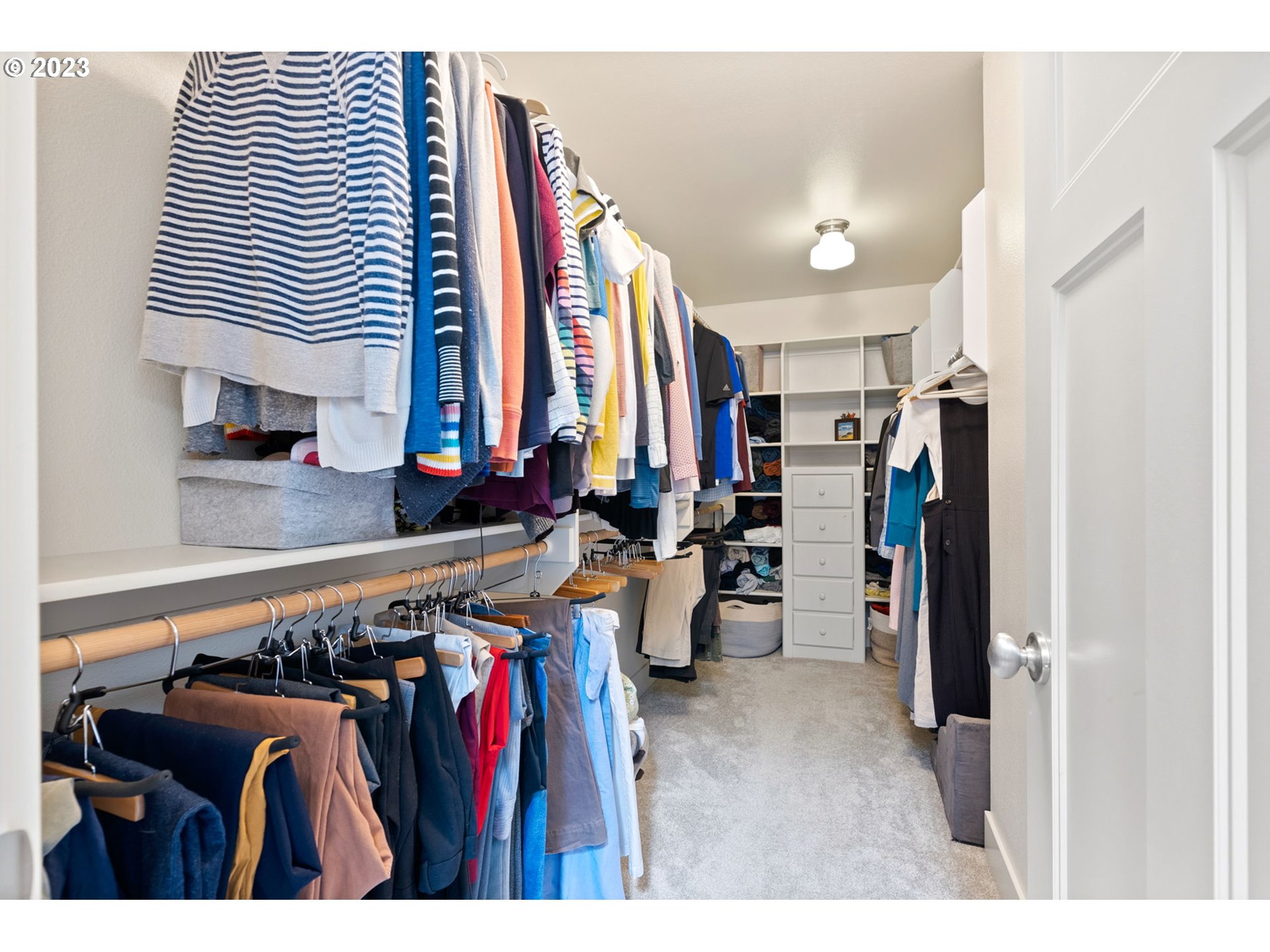 2126 Northwest 32nd Avenue Portland, OR 97210 - Photo 26 of 48 a view of walk in closet with clothes and shoes