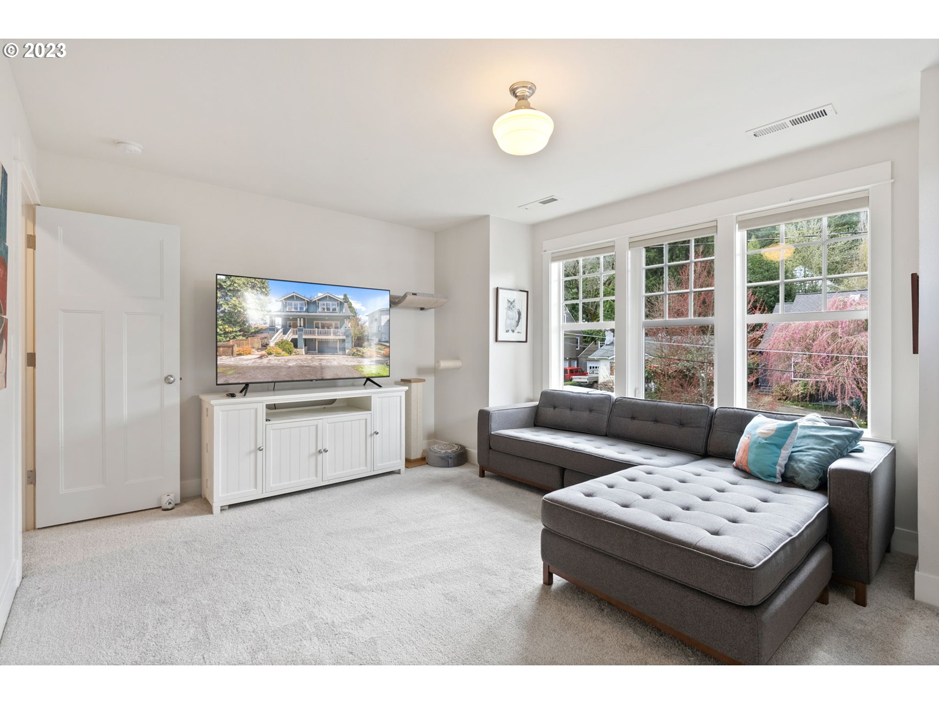 2126 Northwest 32nd Avenue Portland, OR 97210 - Photo 31 of 48 a living room with furniture and windows