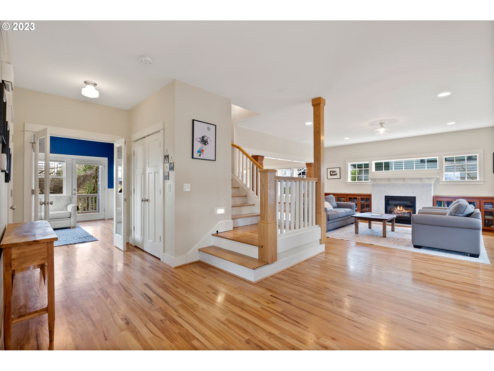 2126 Northwest 32nd Avenue Portland, OR 97210 - Photo 4 of 48 a living room with furniture and a wooden floor