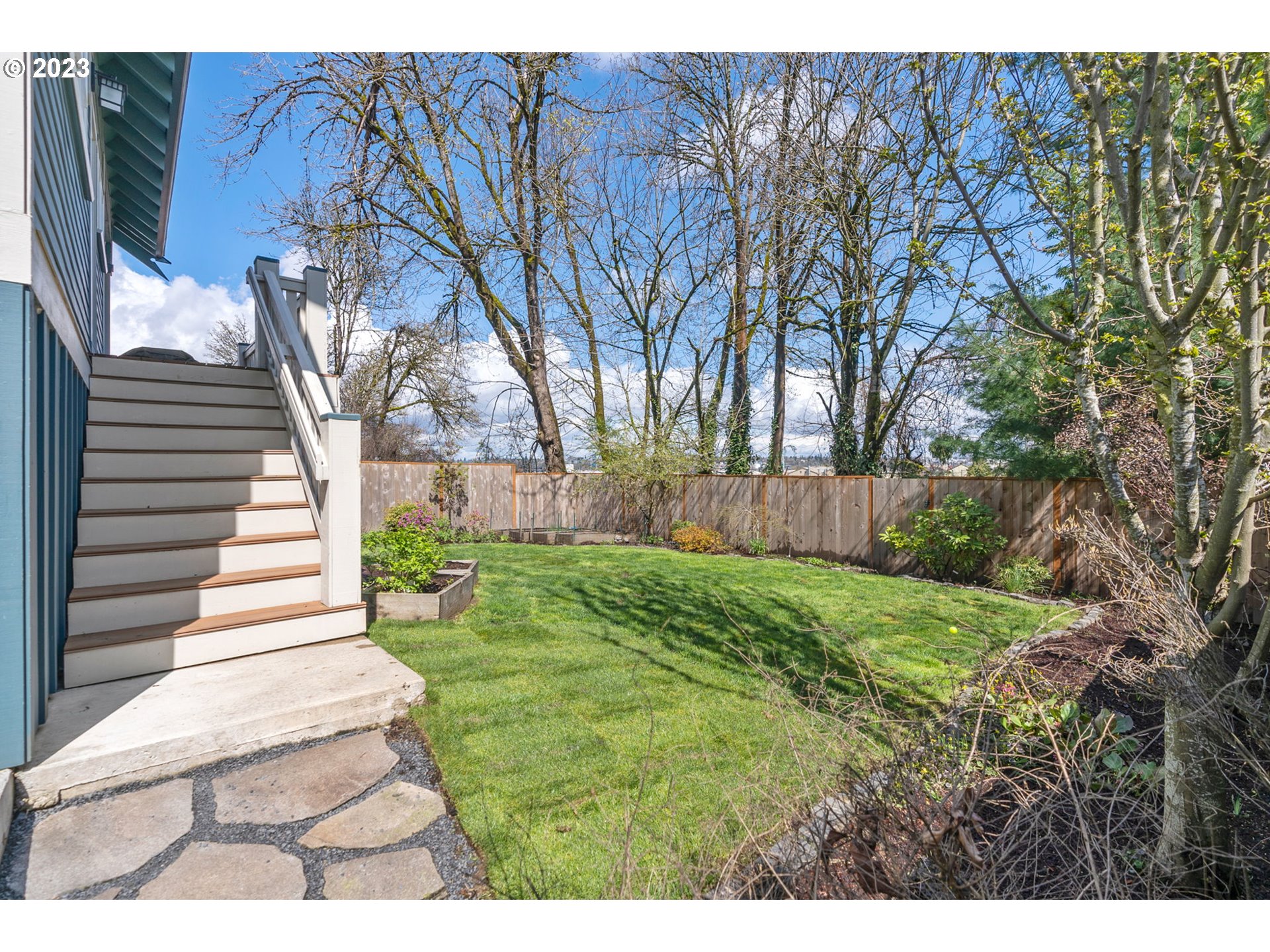2126 Northwest 32nd Avenue Portland, OR 97210 - Photo 43 of 48 a view of a backyard with large trees