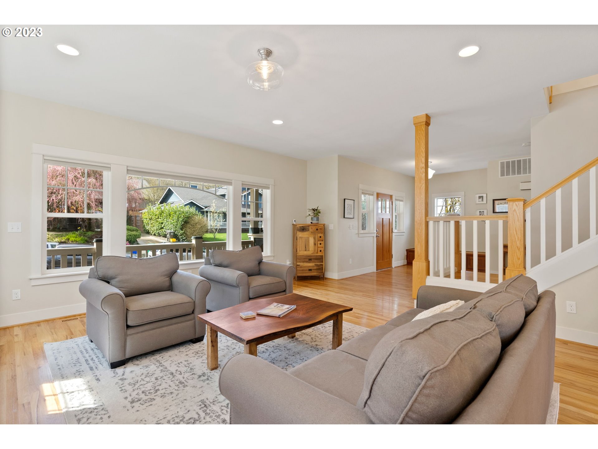 2126 Northwest 32nd Avenue Portland, OR 97210 - Photo 7 of 48 a living room with furniture and a large window