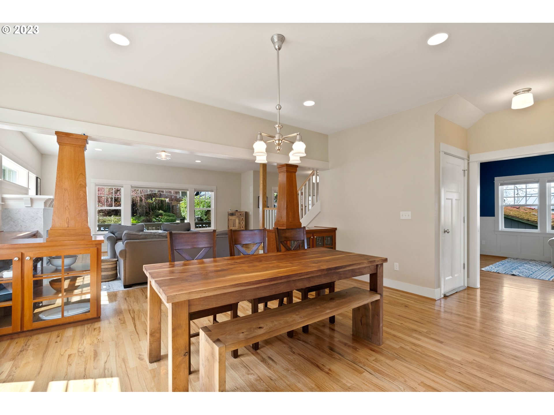 2126 Northwest 32nd Avenue Portland, OR 97210 - Photo 8 of 48 a room with furniture a dining table and a chandelier