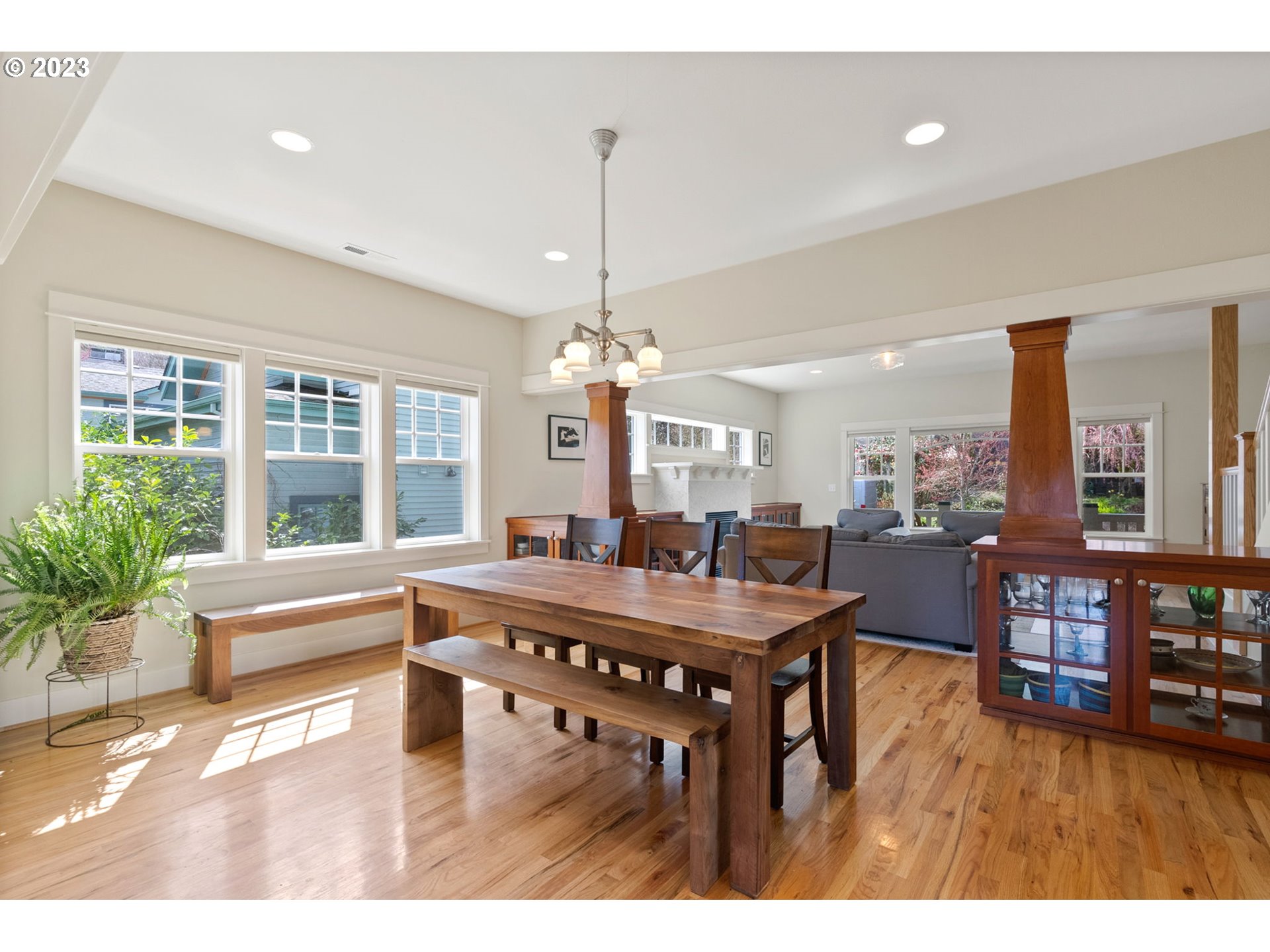 2126 Northwest 32nd Avenue Portland, OR 97210 - Photo 9 of 48 a view of a dining room with furniture window and wooden floor