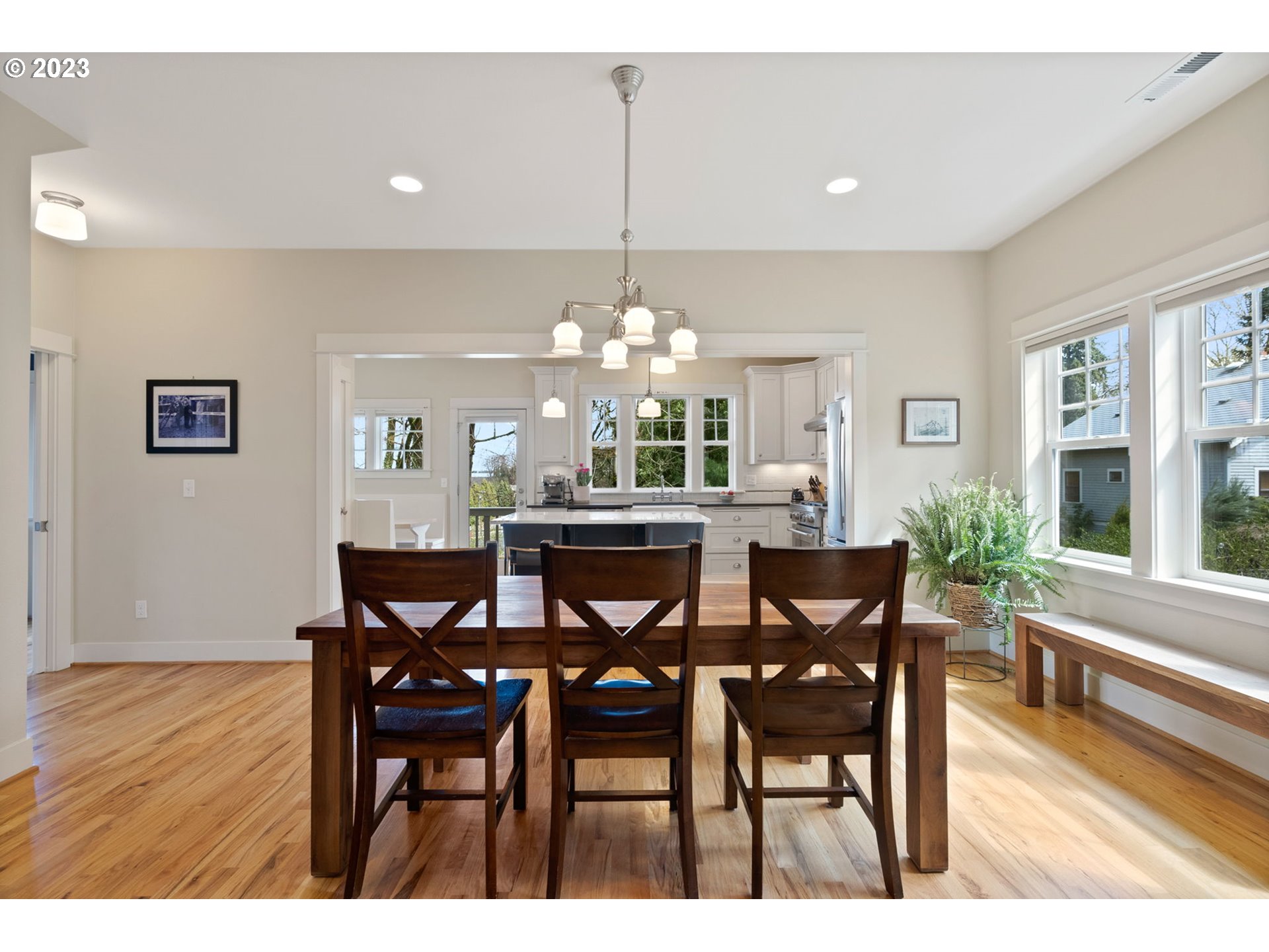 2126 Northwest 32nd Avenue Portland, OR 97210 - Photo 10 of 48 a view of a dining room with furniture and wooden floor