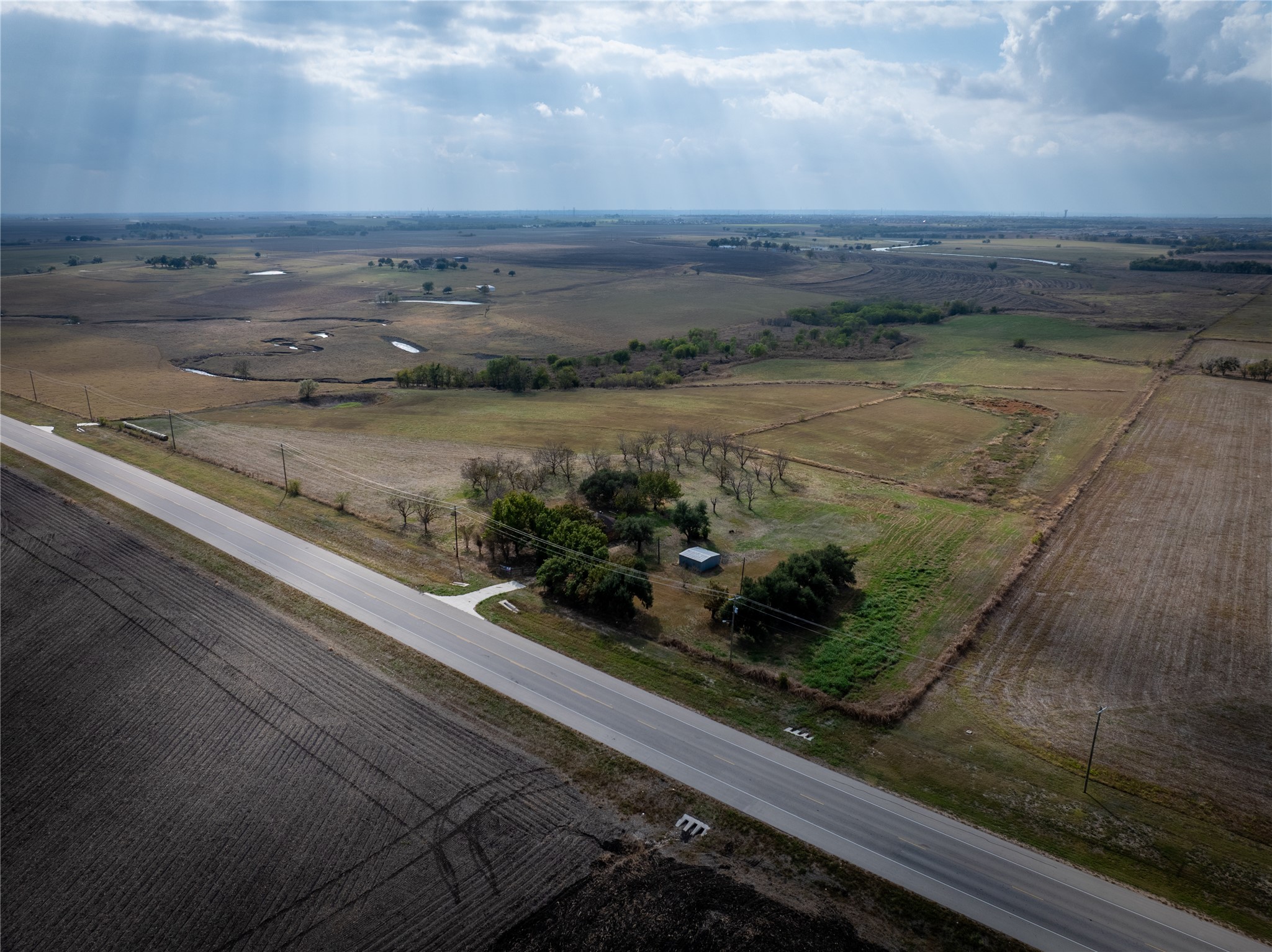 4100 County Road 101 Taylor, TX 76574 - Photo 4 of 17 a view of a lake from a yard