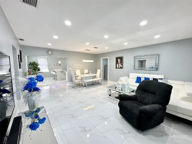 a living room with furniture and a couch