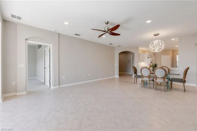 a view of a livingroom with furniture and chandelier