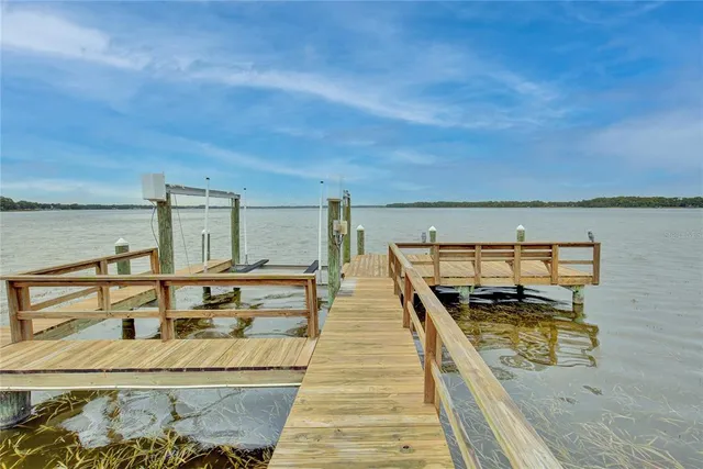 a view of a balcony with two chairs