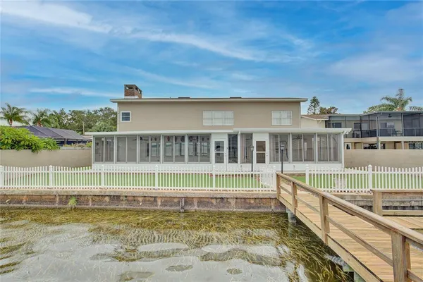 a view of a house with a swimming pool