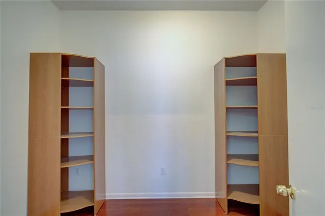 a view of an empty walk in closet