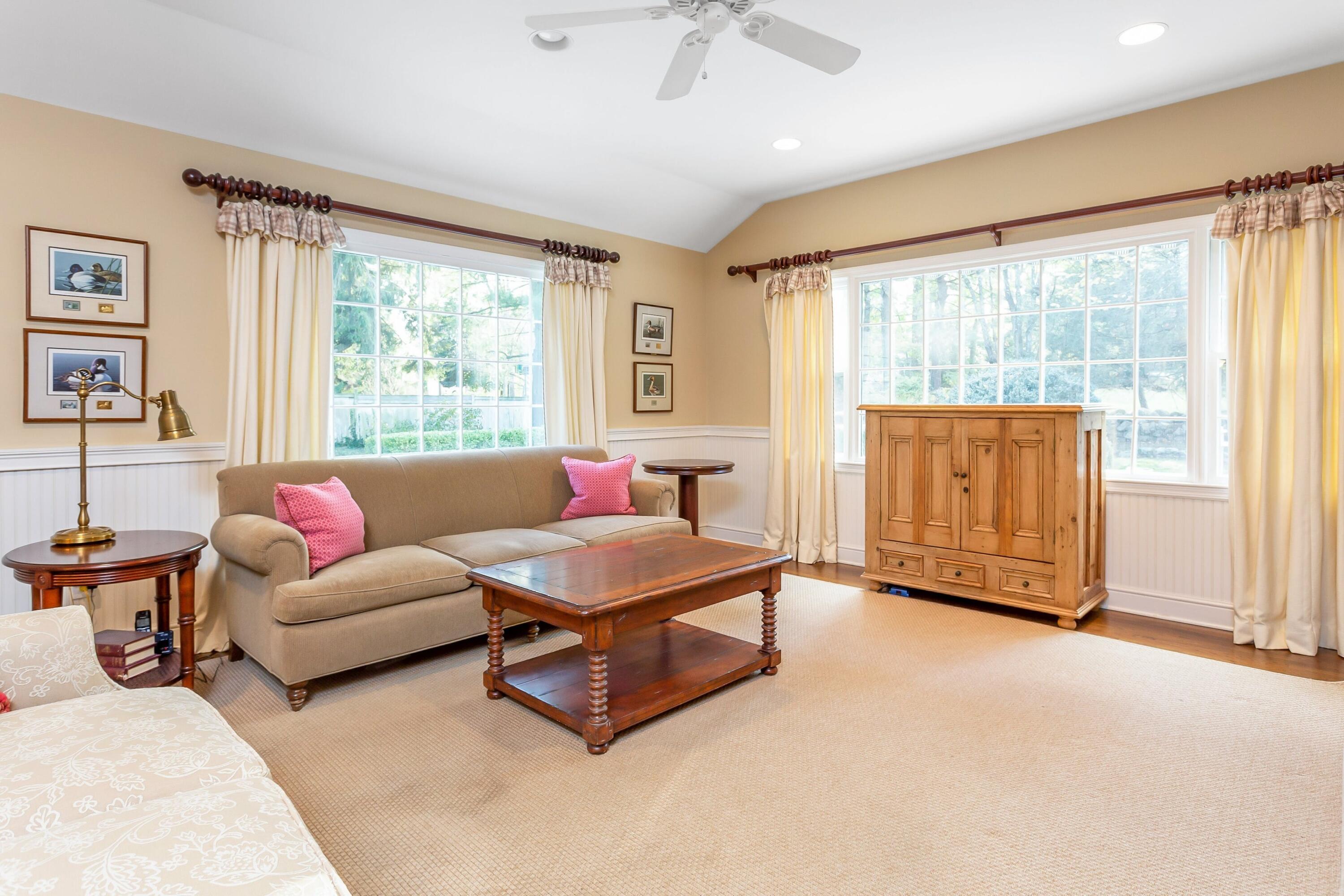 9 Peterick Lane Darien, CT 06820 - Photo 12 of 28 a living room with furniture and a large window