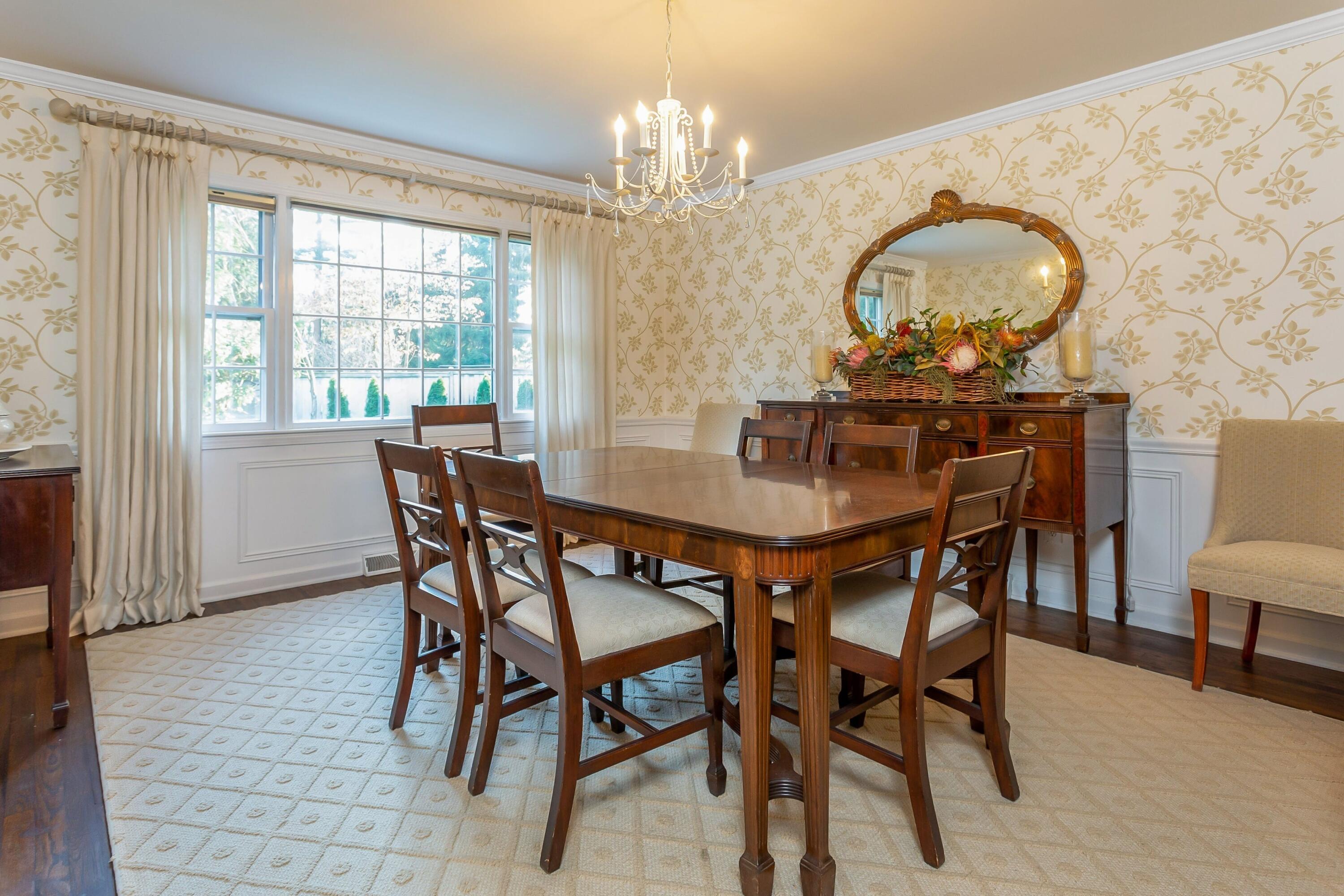 9 Peterick Lane Darien, CT 06820 - Photo 15 of 28 a view of a dining room with furniture window and outside view