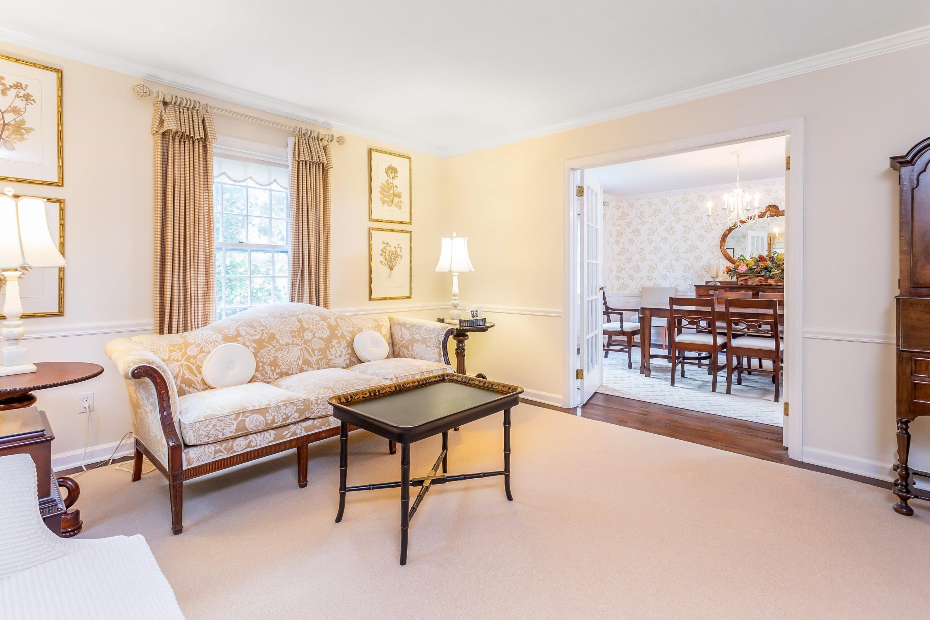 9 Peterick Lane Darien, CT 06820 - Photo 16 of 28 a living room with furniture and a table