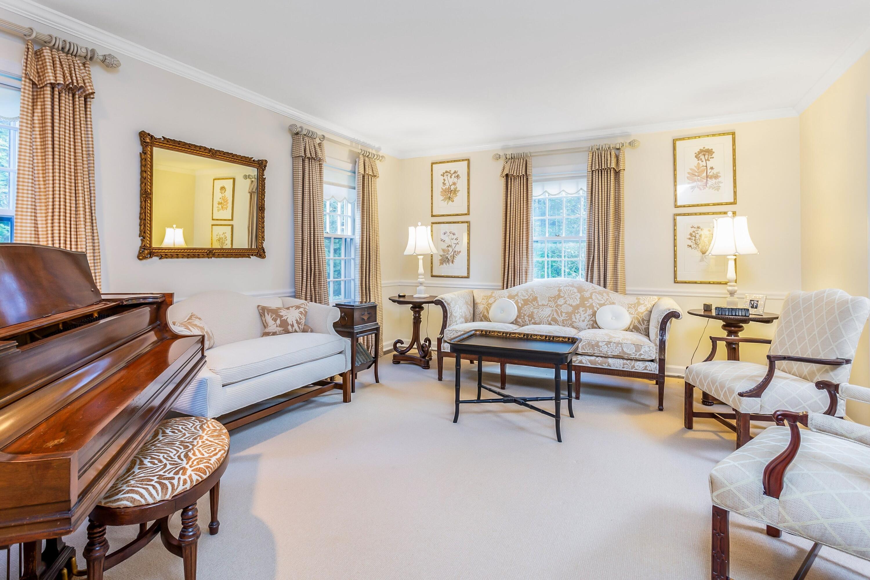 9 Peterick Lane Darien, CT 06820 - Photo 17 of 28 a living room with furniture and a window