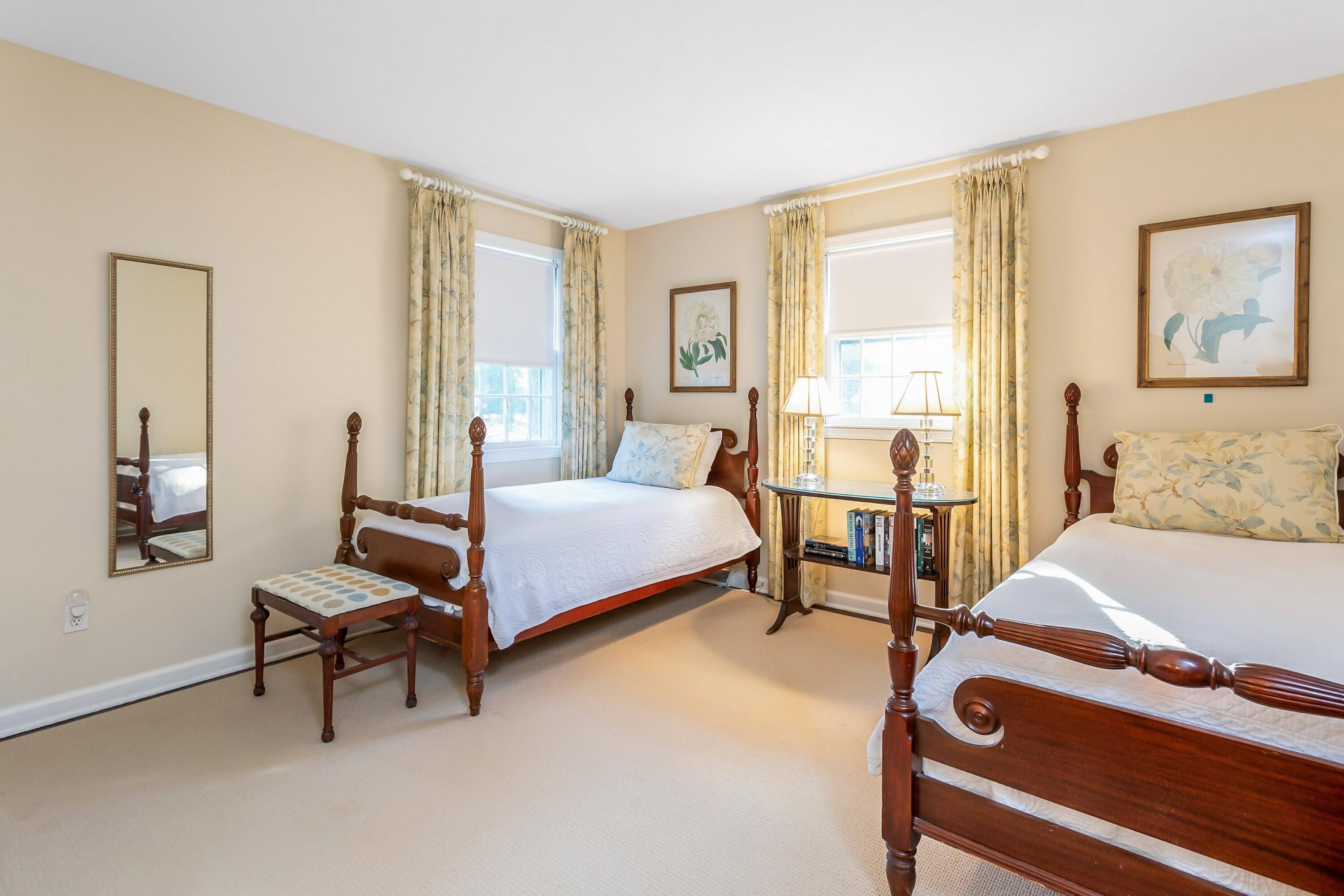 9 Peterick Lane Darien, CT 06820 - Photo 21 of 28 a bedroom with a bed and a window