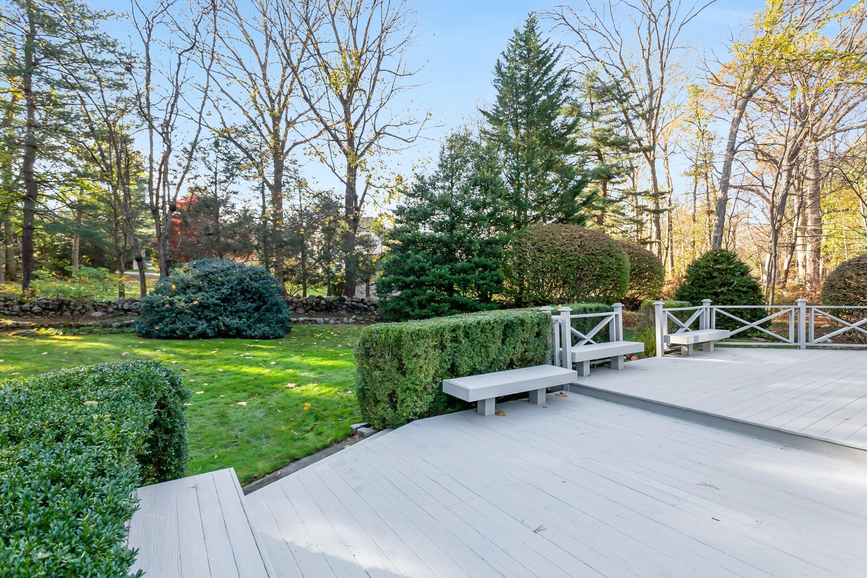 9 Peterick Lane Darien, CT 06820 - Photo 26 of 28 a view of a backyard with sitting area