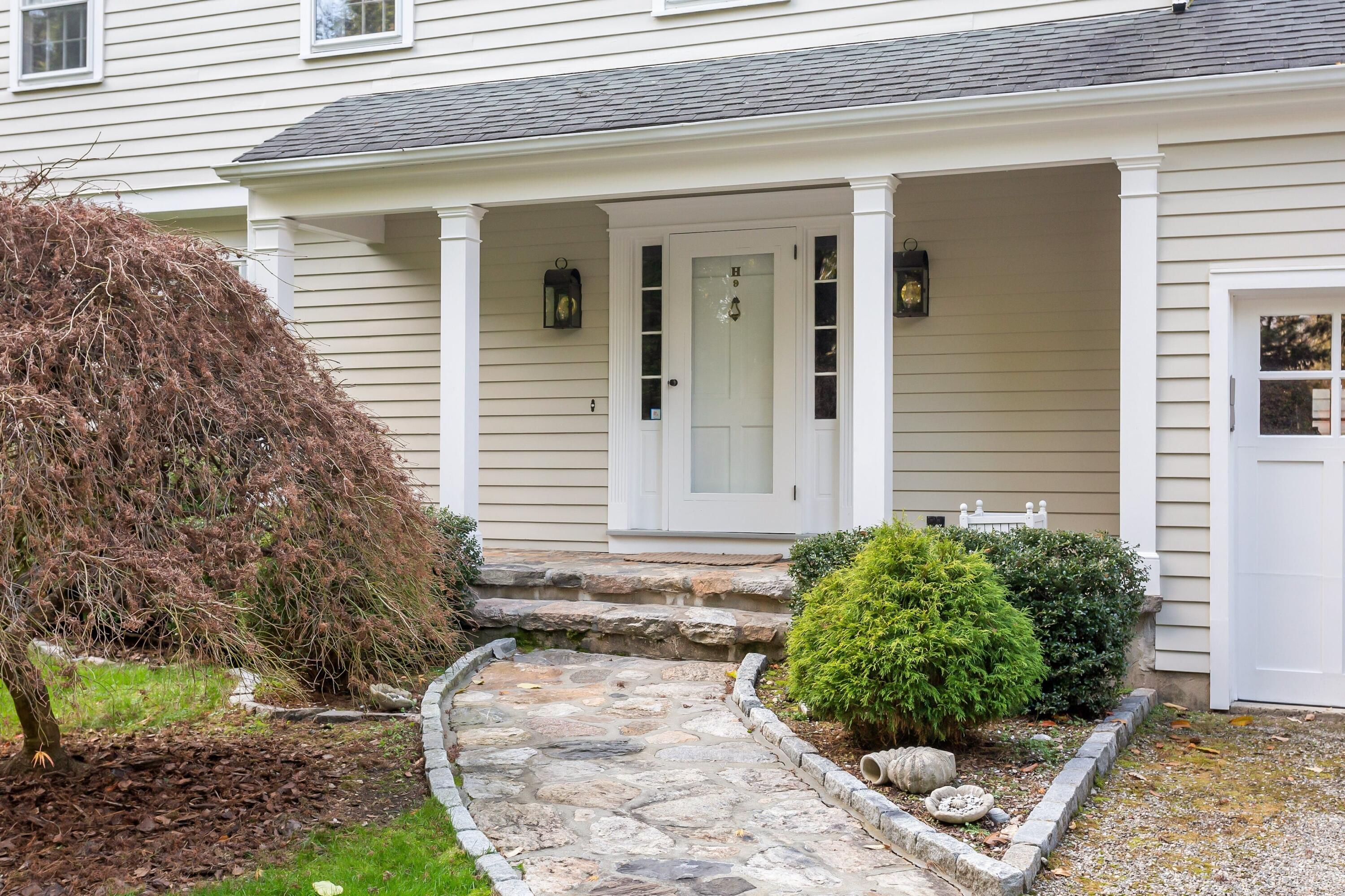 9 Peterick Lane Darien, CT 06820 - Photo 3 of 28 a view of a house with a yard