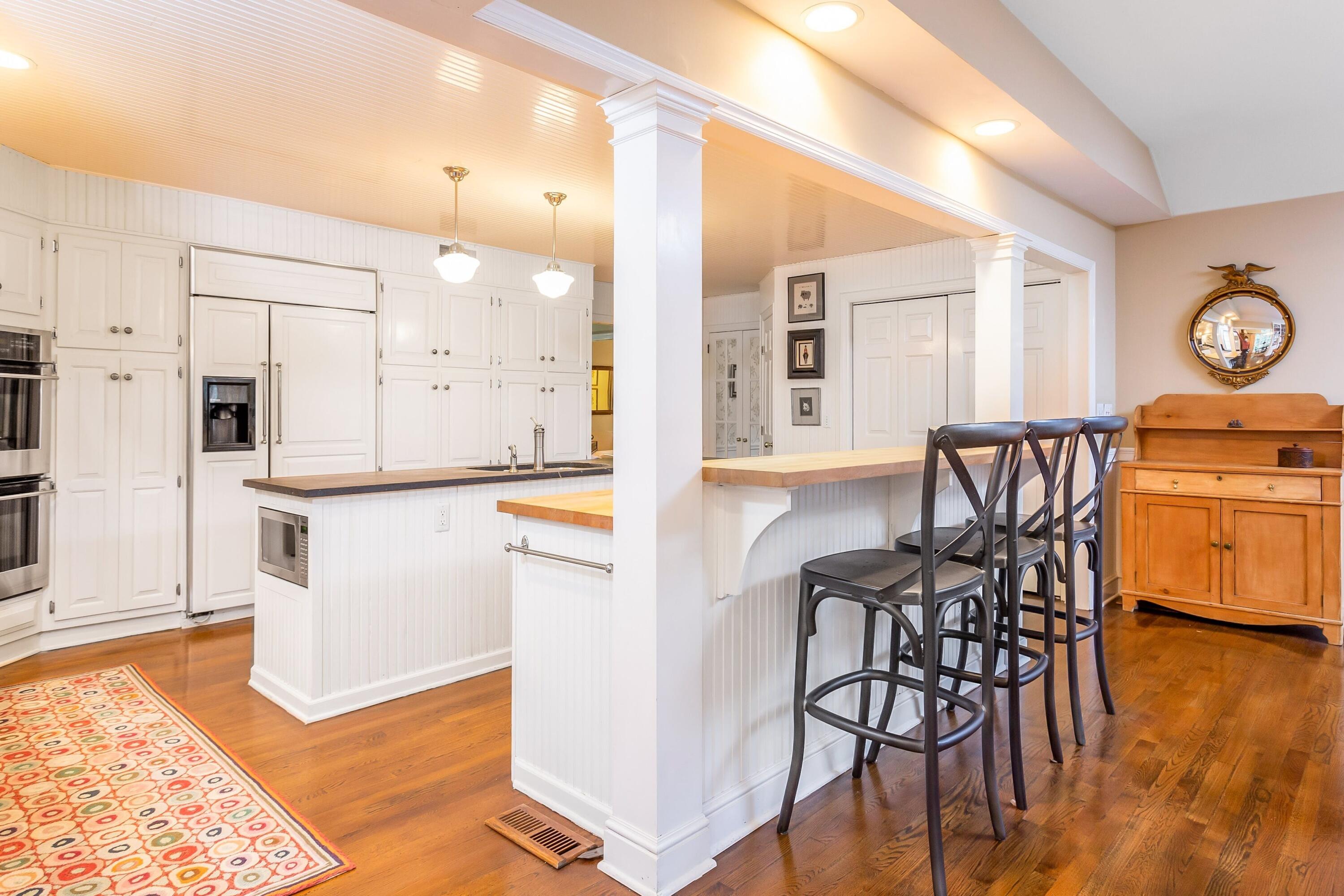 9 Peterick Lane Darien, CT 06820 - Photo 8 of 28 a view of a kitchen and dining room