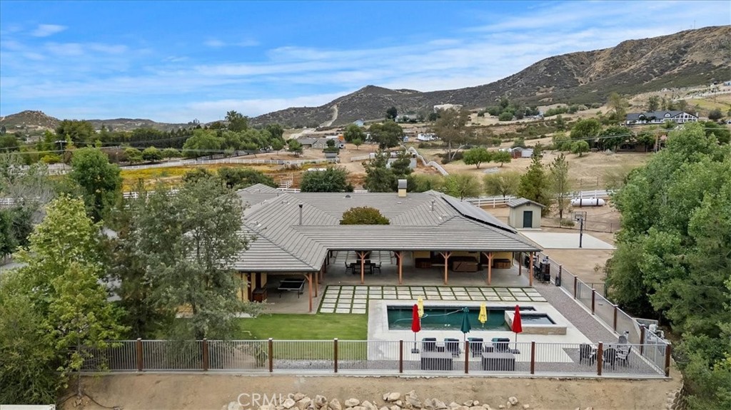 16420 Rocky Glen Road Perris, CA 92570 - Photo 2 of 74 an aerial view of a house with a garden