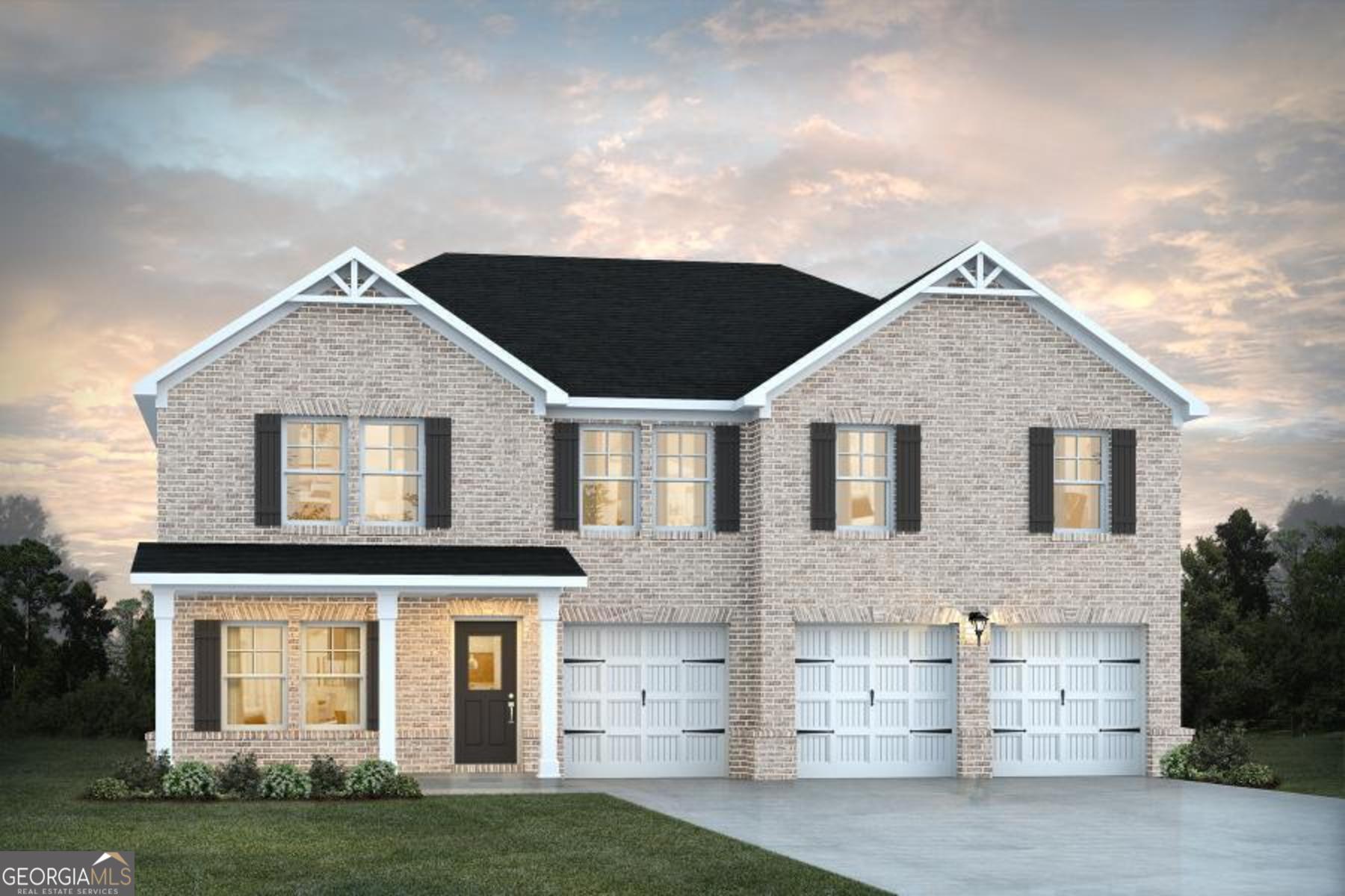 335 Jarrett Street, Unit 151 Fairburn, GA 30213 - Photo 1 of 1 a front view of a house with a yard