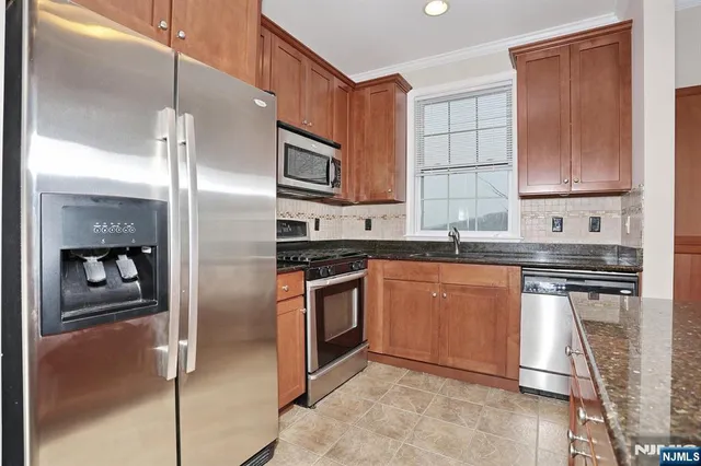 a bathroom with a toilet sink and shower