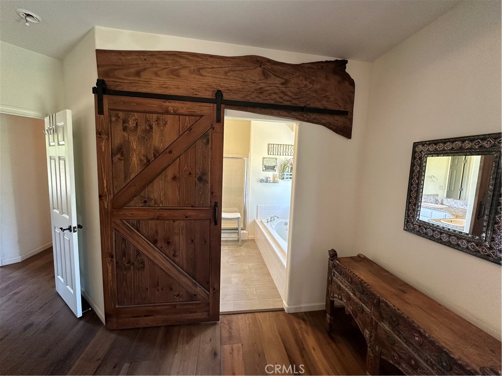 5427 Shooting Star Road Catheys Valley, CA 95306 - Photo 25 of 57 Master Bedroom view into Custom built barn door to Master Bath...