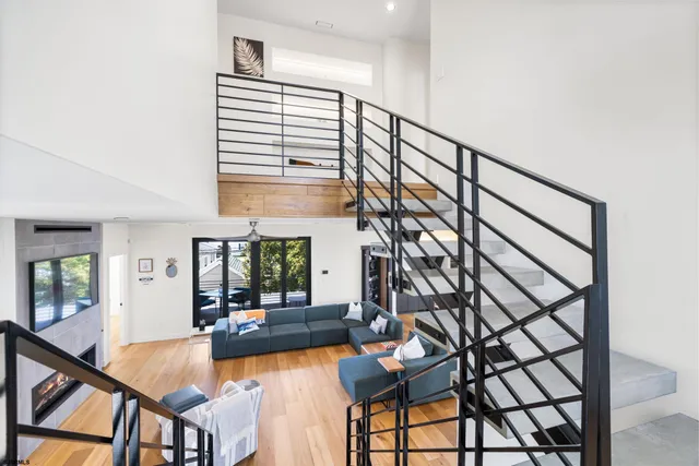 a bed room with a bed and wooden floor