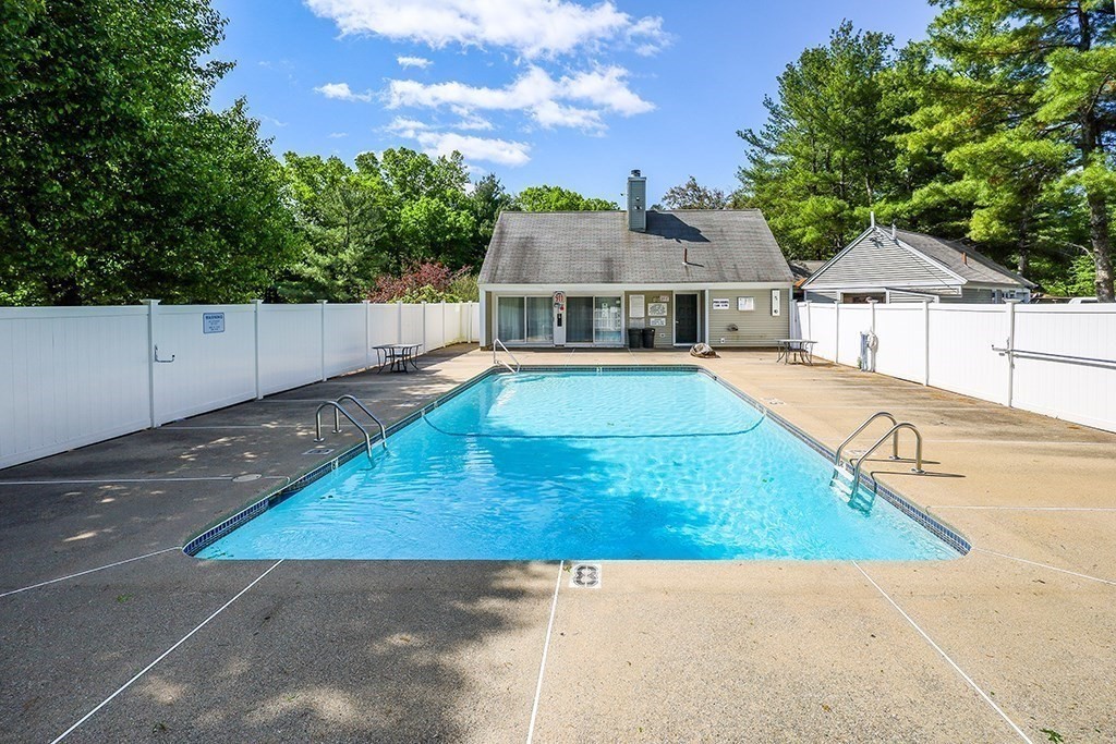 99 Stone Ridge Road, Unit 99 Franklin, MA 02038 - Photo 39 of 39 swimming pool view with a garden
