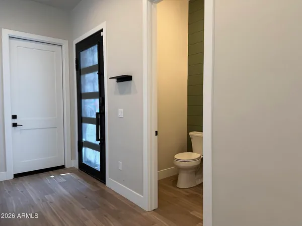 a kitchen with stainless steel appliances a refrigerator sink and cabinets