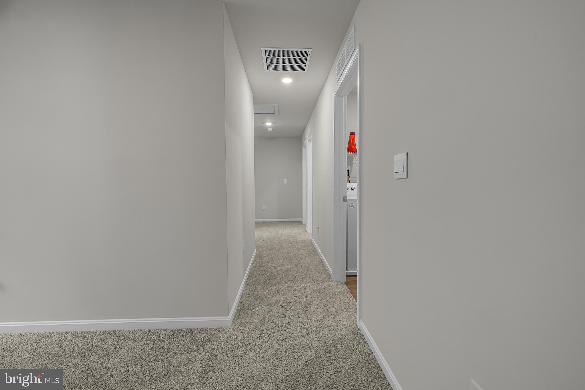 459 Currant Circle Magnolia, DE 19962 - Photo 20 of 39 a view of a hallway with wooden floor