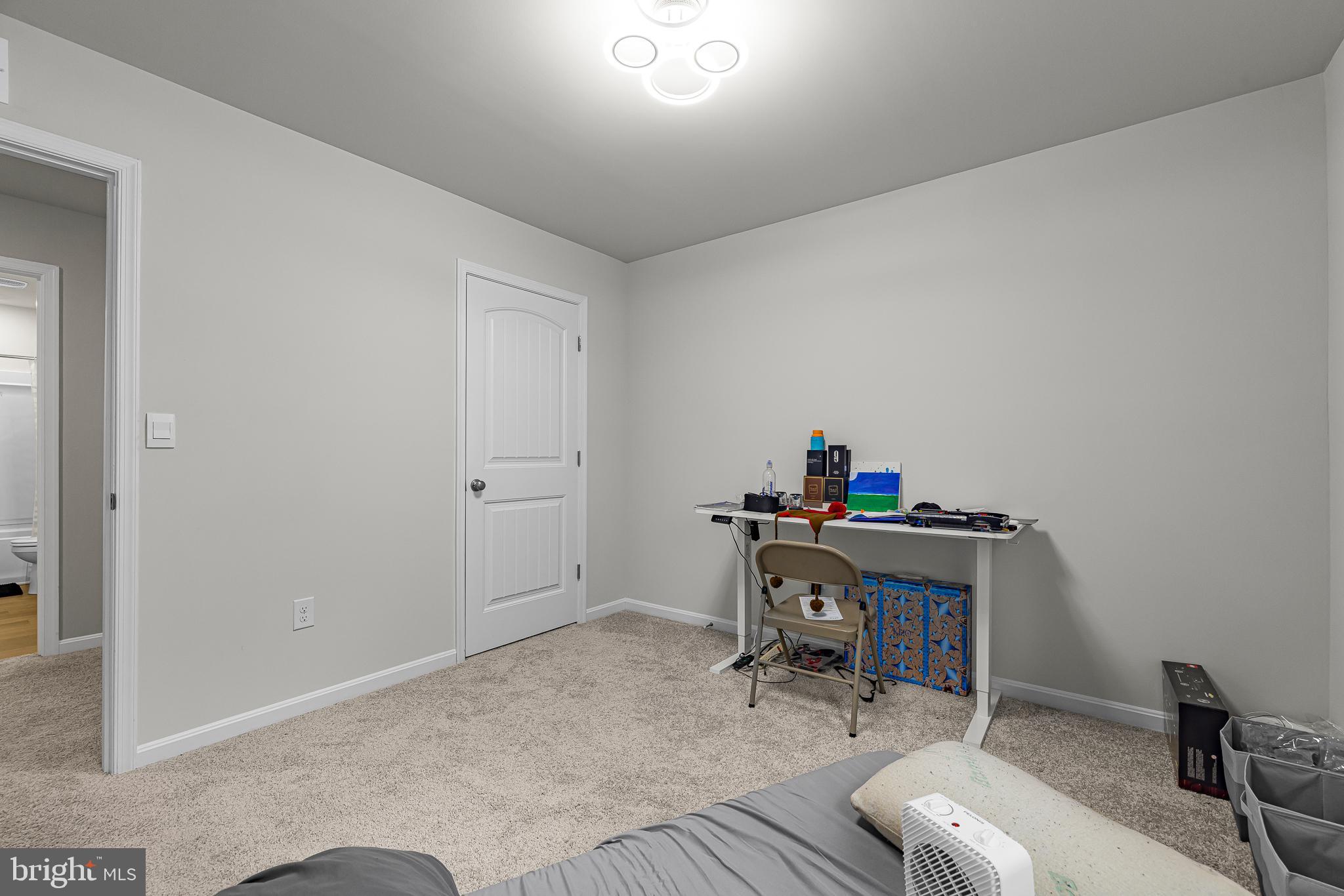 459 Currant Circle Magnolia, DE 19962 - Photo 24 of 39 a view of a workspace with furniture and wooden floor