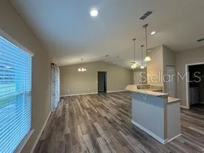 a view of kitchen and sink