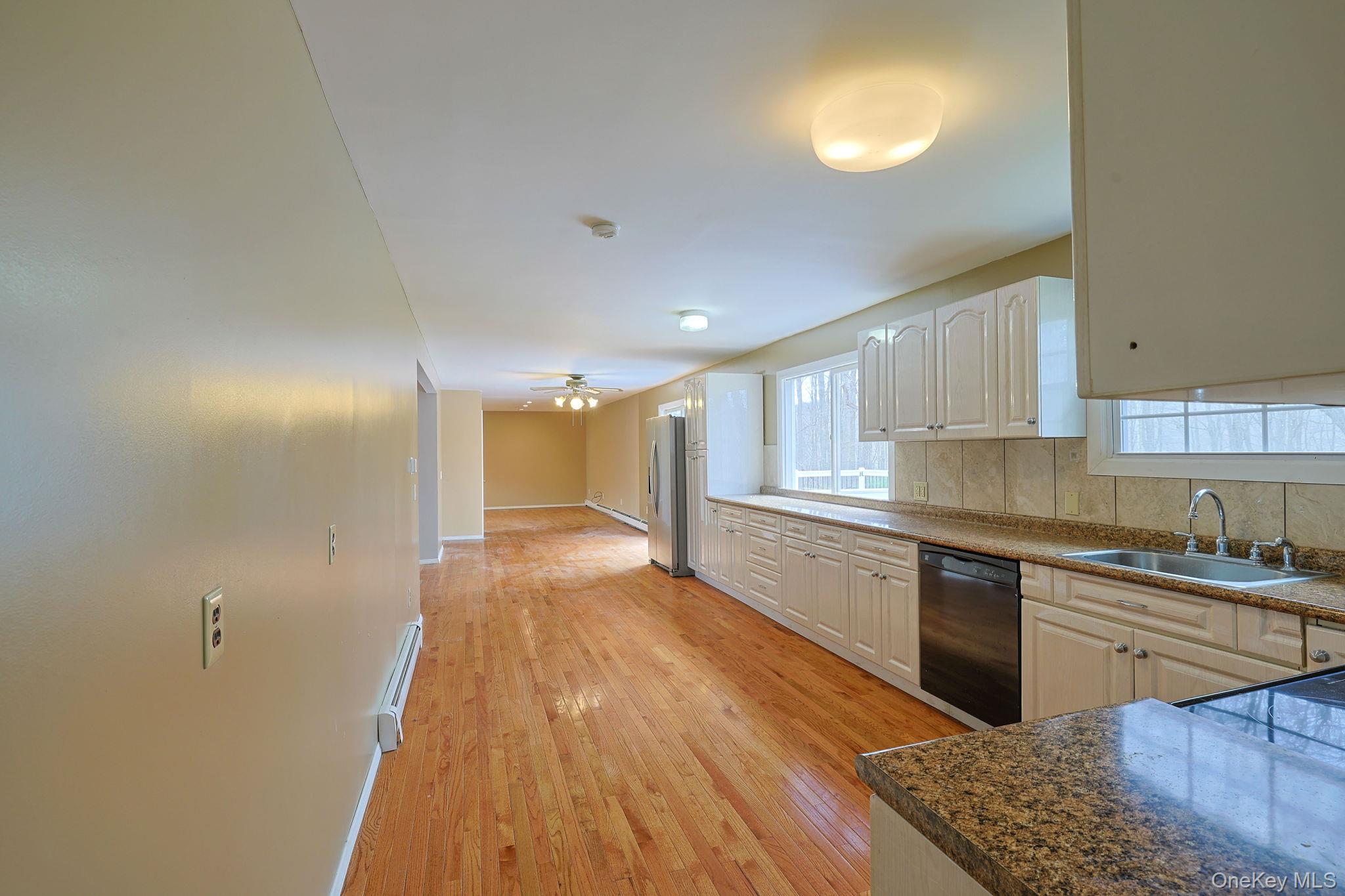 78 Pickerel Road Monroe, NY 10950 - Photo 12 of 41 a large kitchen with a sink and cabinets