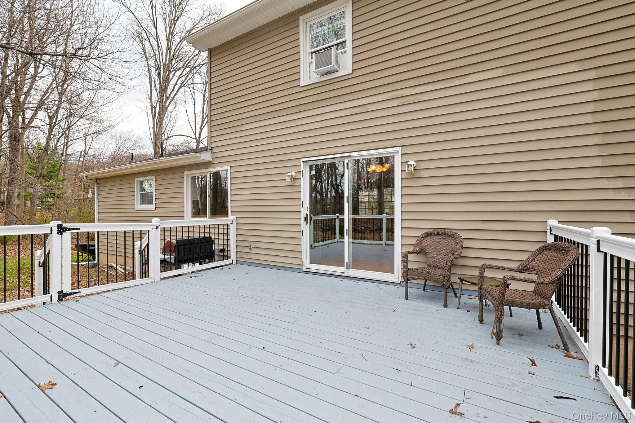 78 Pickerel Road Monroe, NY 10950 - Photo 18 of 41 a view of a house with wooden deck