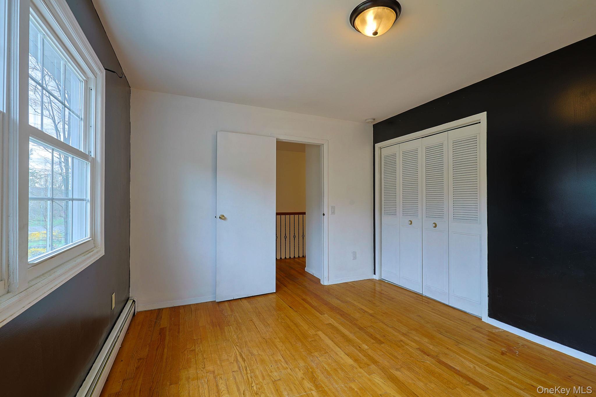 78 Pickerel Road Monroe, NY 10950 - Photo 30 of 41 a bedroom with a bed and a window